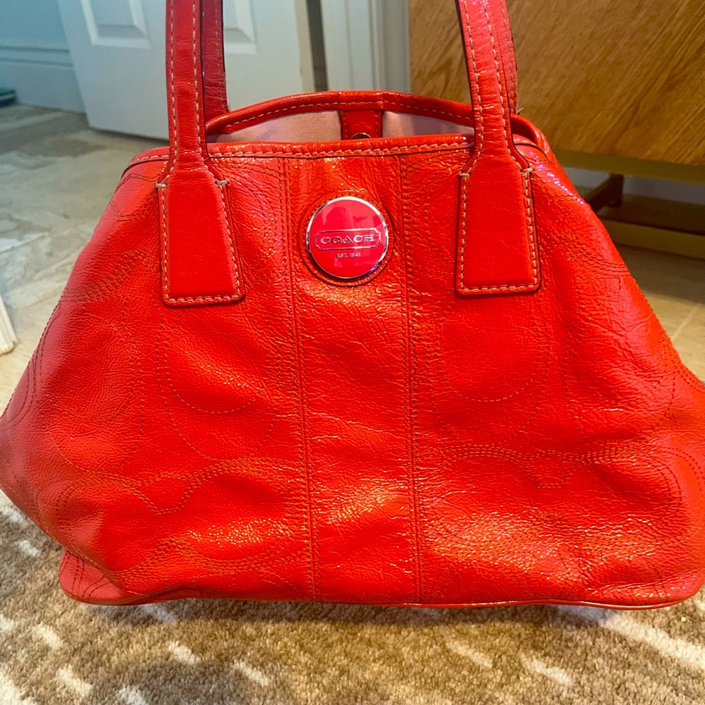 Coach coral patent purse.  Super cute for summer